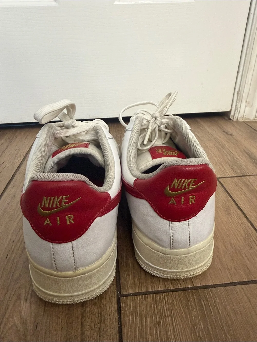 Nike Air Force 1 '07 ESS White Sneakers with Red Swoosh